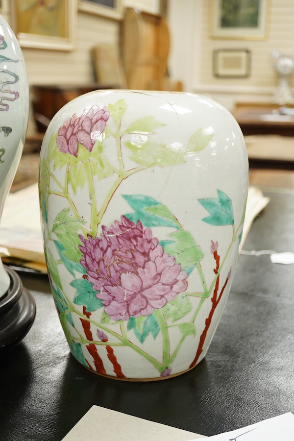 A Chinese famille rose vase and cover on stand, a smaller famille rose vase, vase and cover 50 cm high including stand., Condition - smaller vase in pieces and reglued.